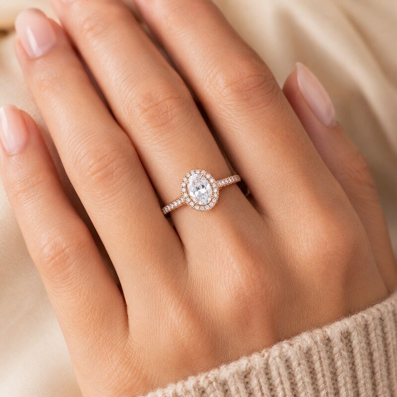 Rose Gold Stainless Steel Oval Halo Engagement Ring - on-hand view