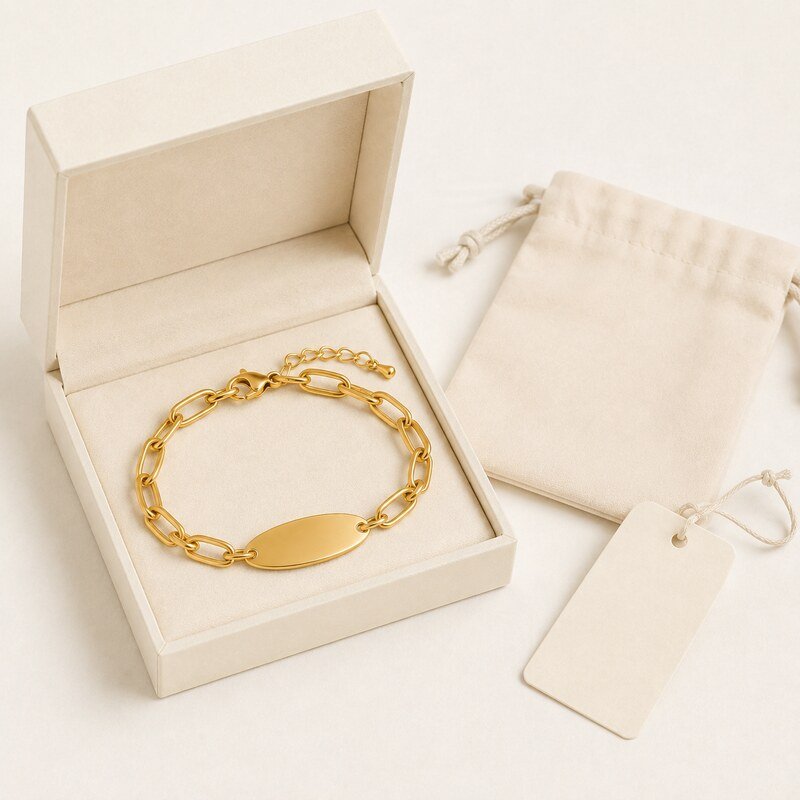 Custom OEM gold stainless steel bracelet presented with blank jewelry packaging