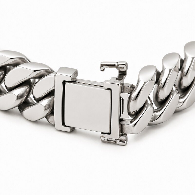 Close-up of stainless steel Cuban bracelet box clasp and safety catches