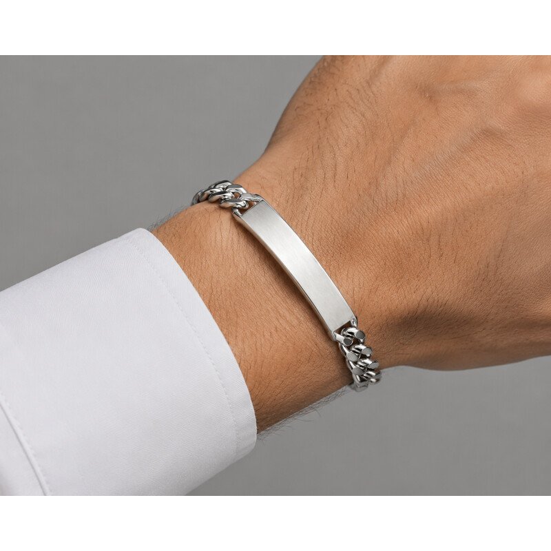 Men's stainless steel ID bracelet with blank plate worn on wrist