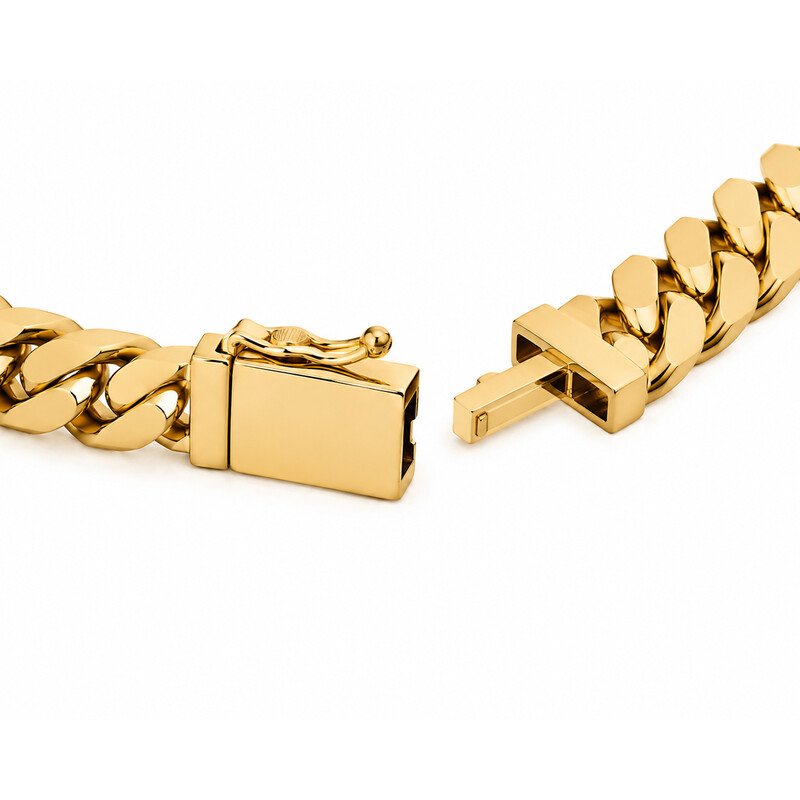 Gold curb chain bracelet box clasp detail