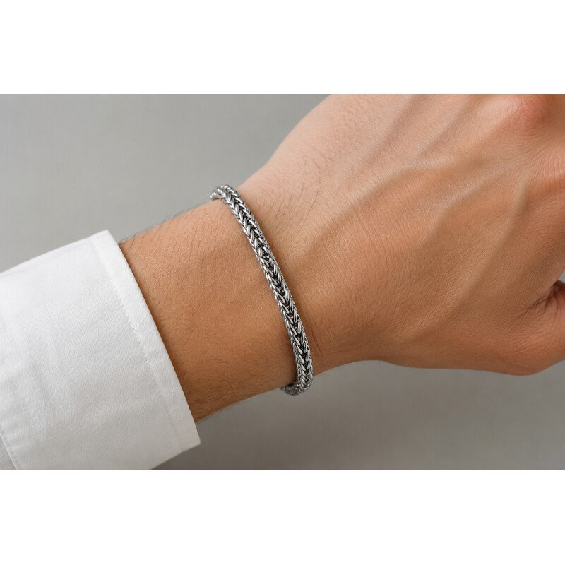 Silver foxtail chain bracelet worn on wrist