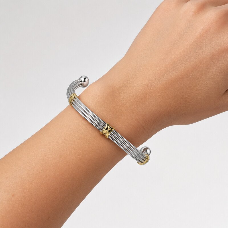 Two tone stainless steel wire cuff bracelet on wrist