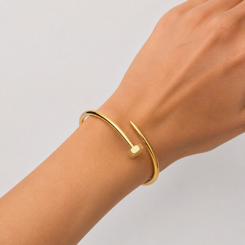 Gold stainless steel nail bracelet on wrist