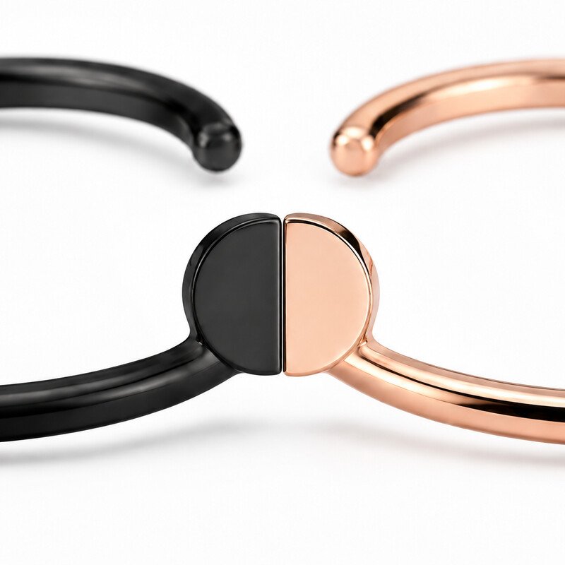 Matching stainless steel couple cuff bracelets 45 degree view