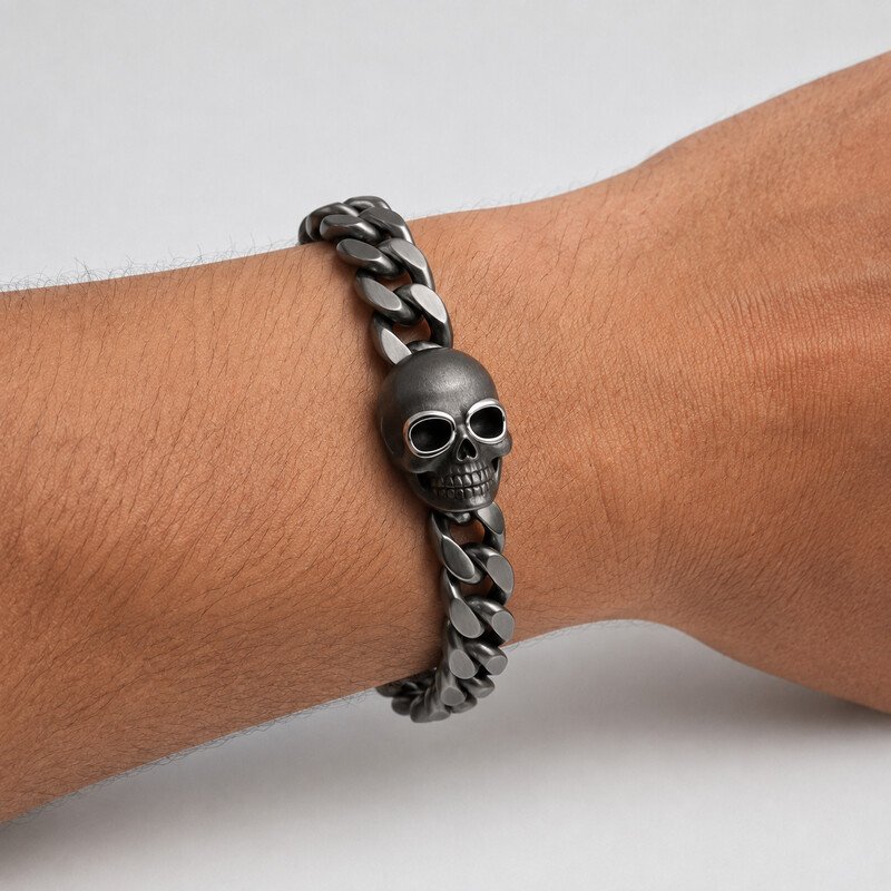 Mens gunmetal skull bracelet worn on wrist