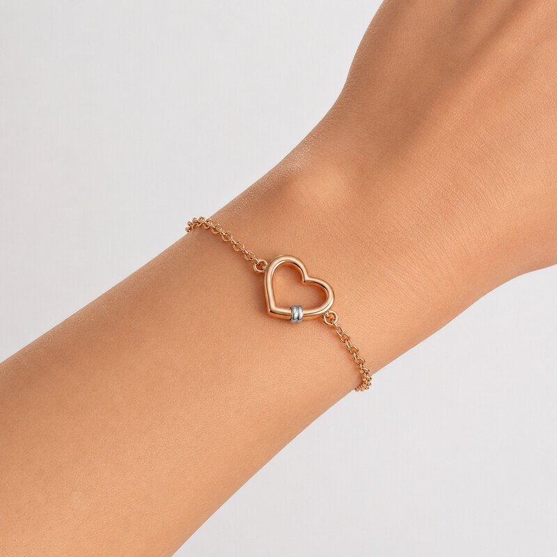Rose gold heart bracelet worn on wrist