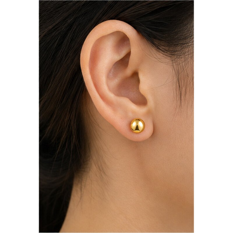 gold stainless steel stud earrings - model view