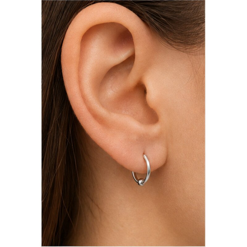 stainless steel conch earrings - model view