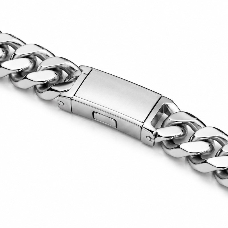 Close-up of the rectangular box clasp and links on a stainless steel Cuban chain