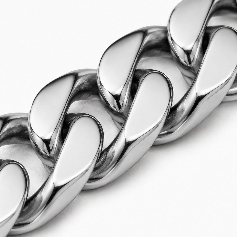 Mirror-polished and brushed surface detail of solid stainless steel Cuban links