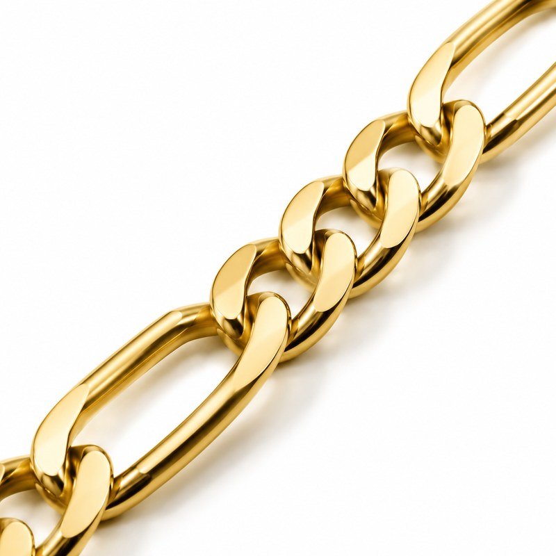 Polished gold Figaro chain detail showing the three-short-one-long link pattern