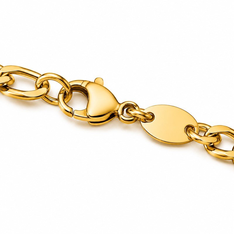 Close-up of the lobster clasp and blank end tag on a gold stainless steel Figaro chain