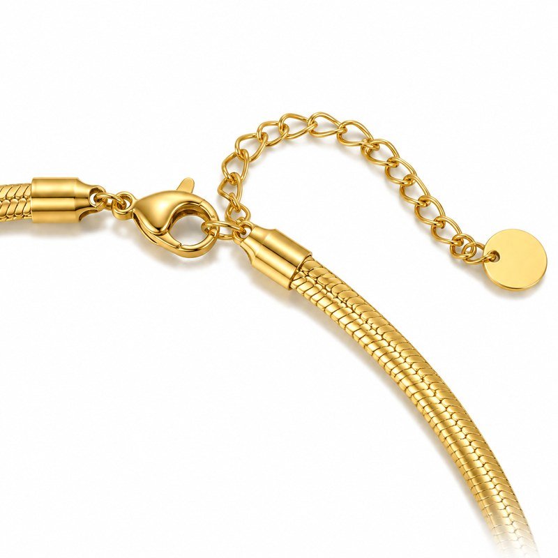 Close-up of the lobster clasp, extender and end tag on a gold snake chain