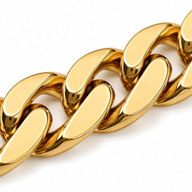 Polished gold PVD stainless steel curb chain link craftsmanship macro detail