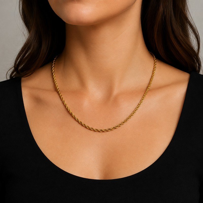 Woman wearing a gold stainless steel rope chain necklace, 3 mm wide and adjustable length