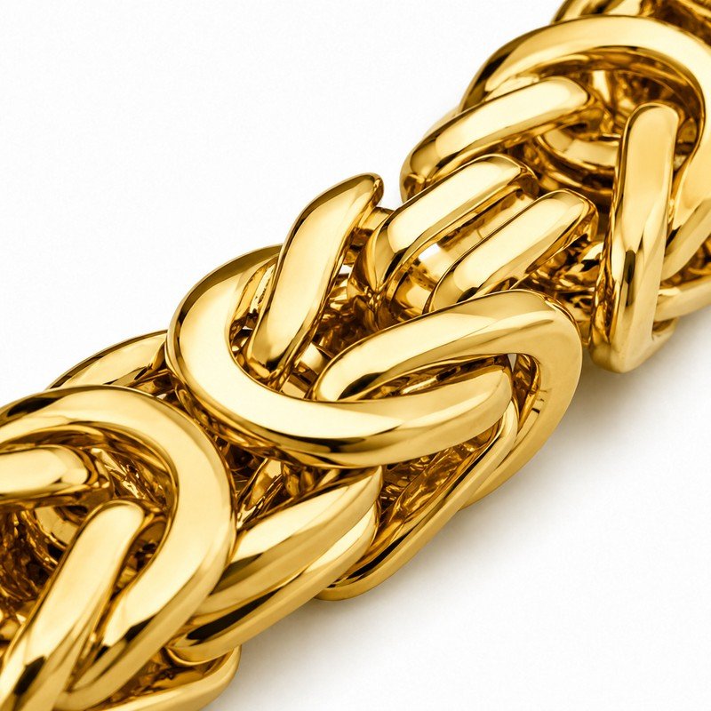 Polished gold PVD stainless steel Byzantine link macro detail