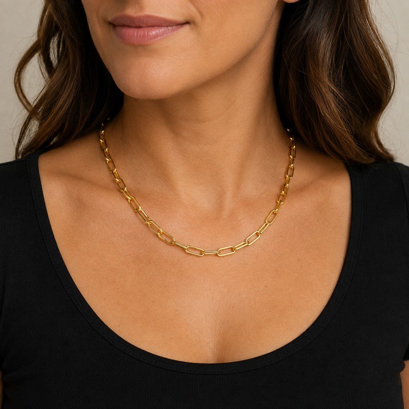 Woman wearing gold stainless steel paperclip chain necklace