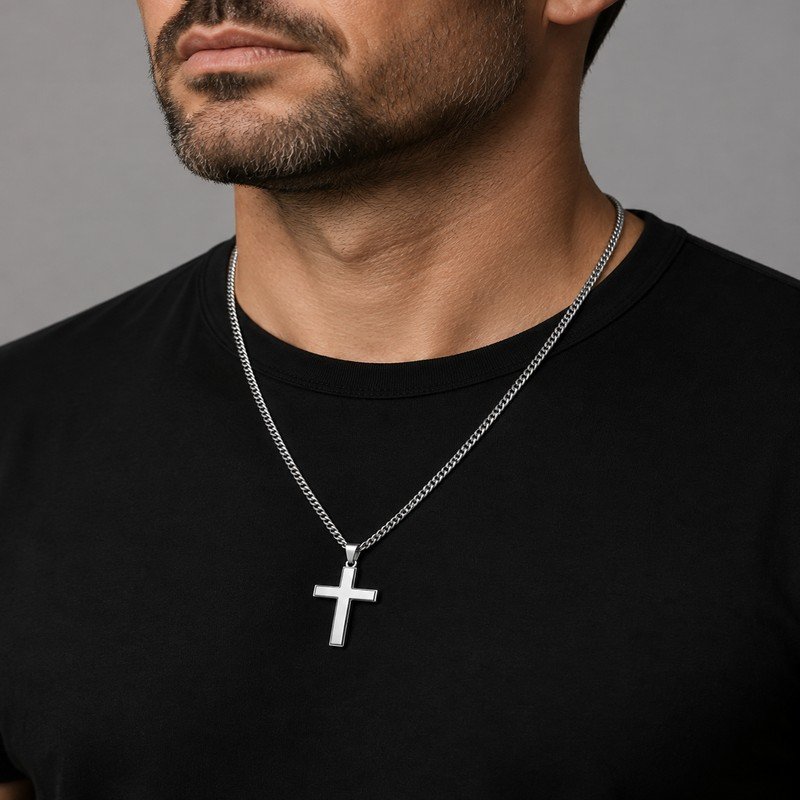 Man wearing silver stainless steel cross pendant necklace