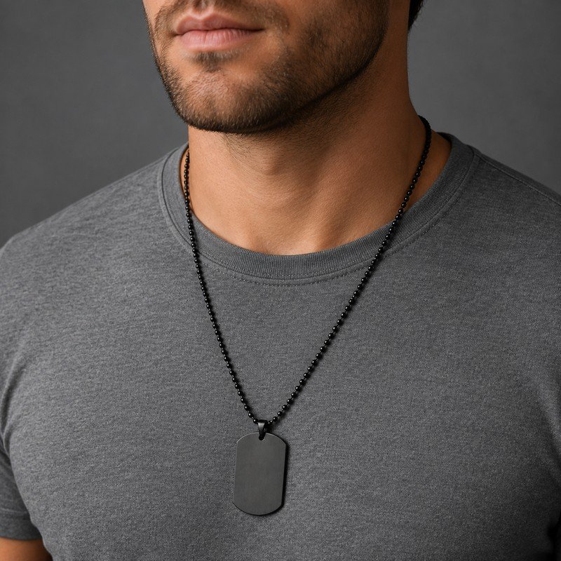 Man wearing black stainless steel dog tag necklace