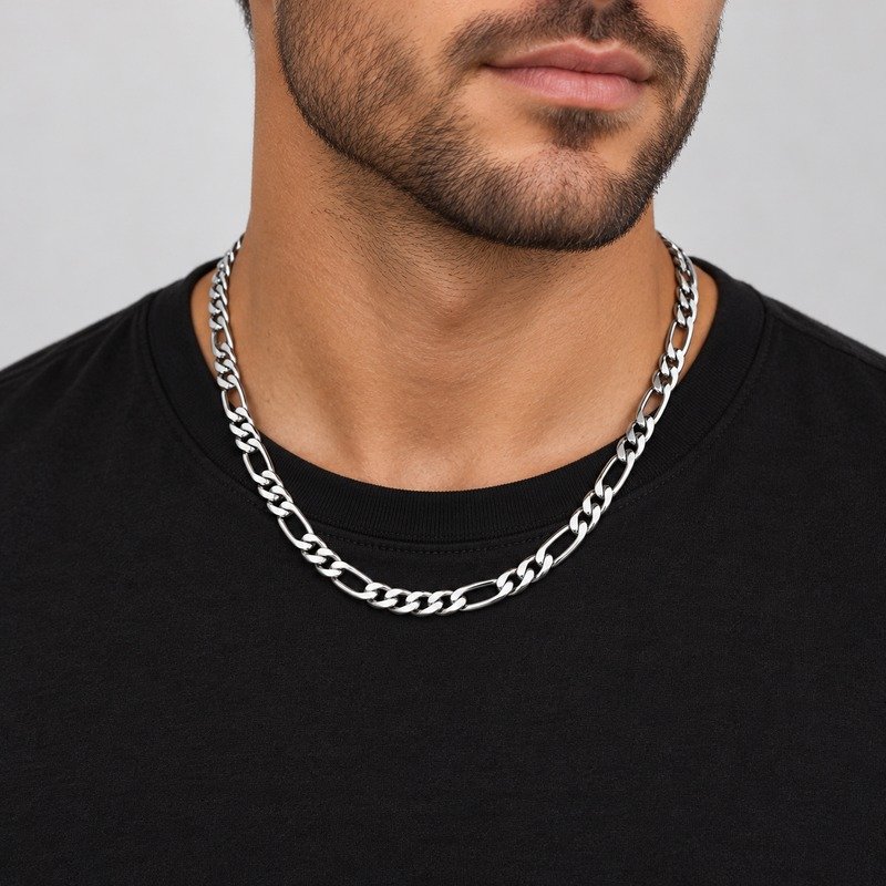 Adult man wearing a silver 6 mm Stainless Steel Figaro chain necklace