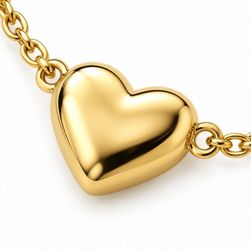 Polished gold Stainless Steel heart pendant surface and cable-chain craftsmanship macro