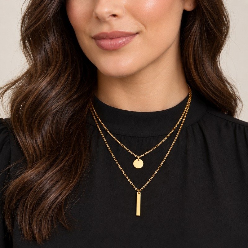 Adult woman wearing a gold Stainless Steel connected two-layer disc and bar necklace