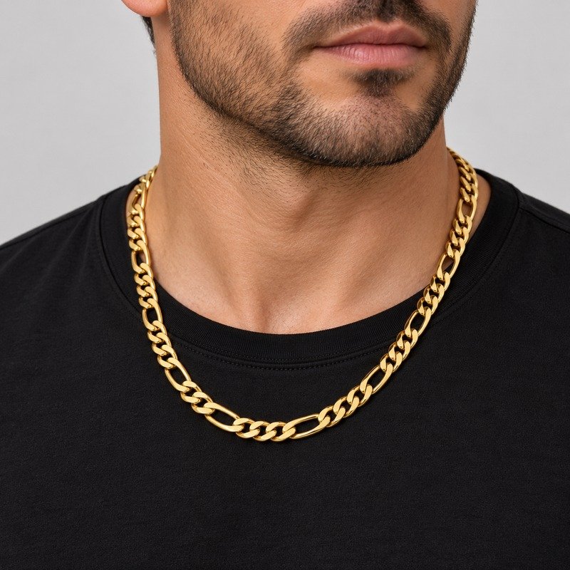 Adult man wearing a gold 7 mm Stainless Steel Figaro chain necklace