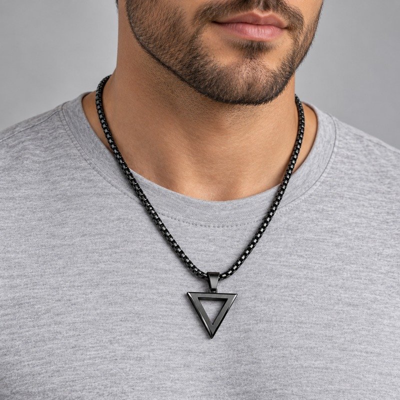 Adult man wearing a black Stainless Steel open triangle pendant necklace