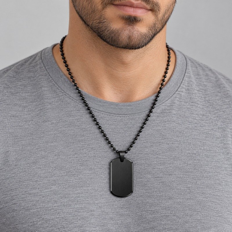 Man wearing a black Stainless Steel dog tag necklace