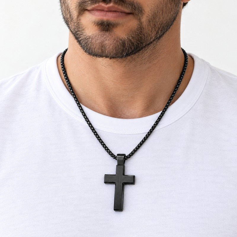 Man wearing a black Stainless Steel cross pendant necklace