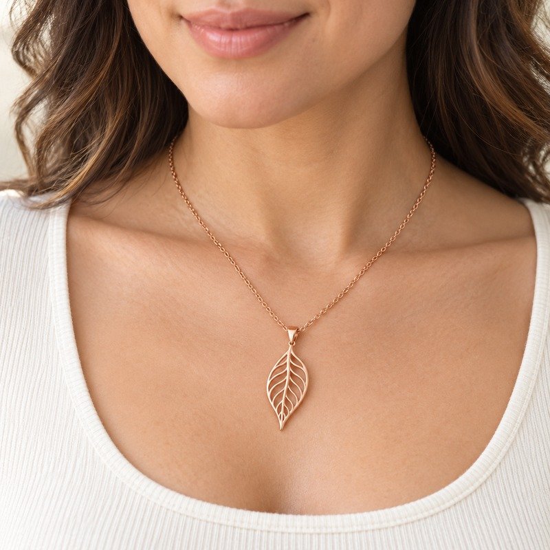 Woman wearing a rose gold Stainless Steel leaf pendant necklace