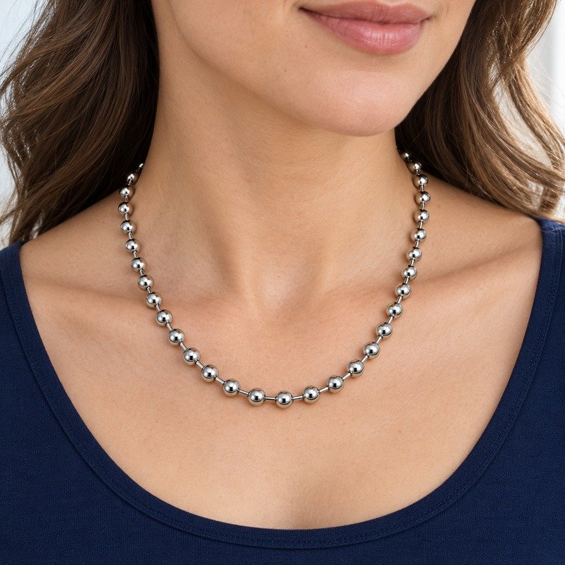 womens silver Stainless Steel ball chain necklace, worn by an adult model