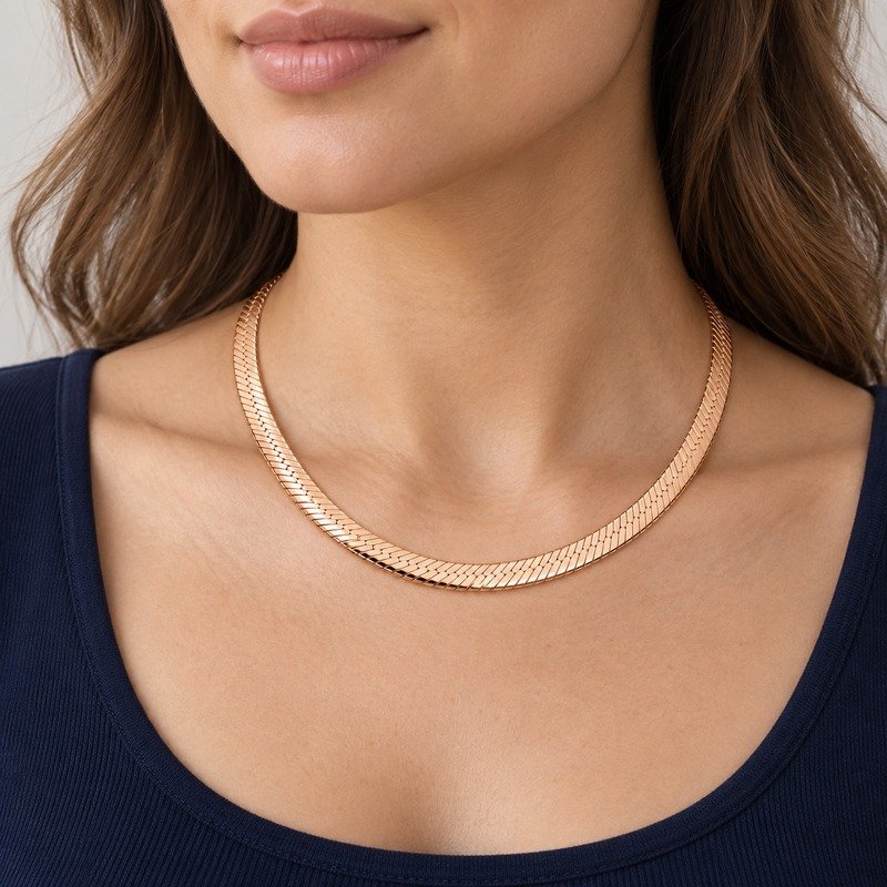 womens rose gold Stainless Steel herringbone necklace, worn by an adult model