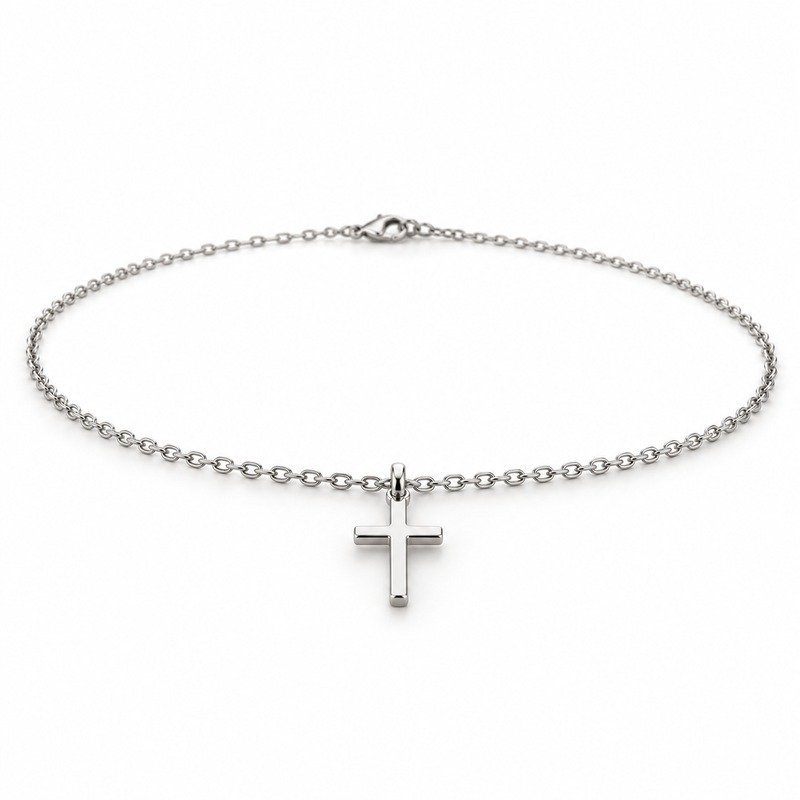 womens silver Stainless Steel petite cross pendant necklace, at a 45-degree angle on white