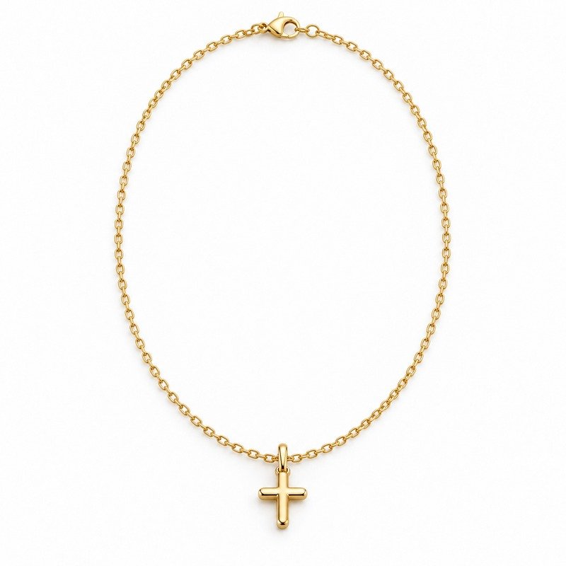 womens gold Stainless Steel petite cross pendant necklace, front view on white