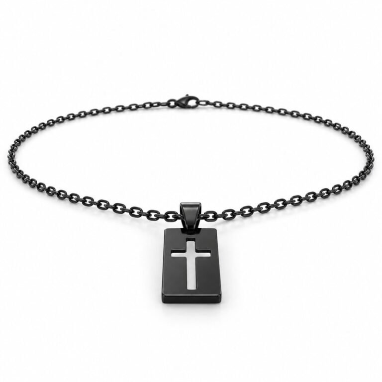 mens black Stainless Steel cutout cross pendant necklace, at a 45-degree angle on white
