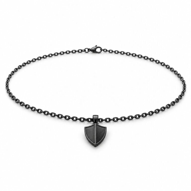 mens black Stainless Steel shield pendant necklace, at a 45-degree angle on white