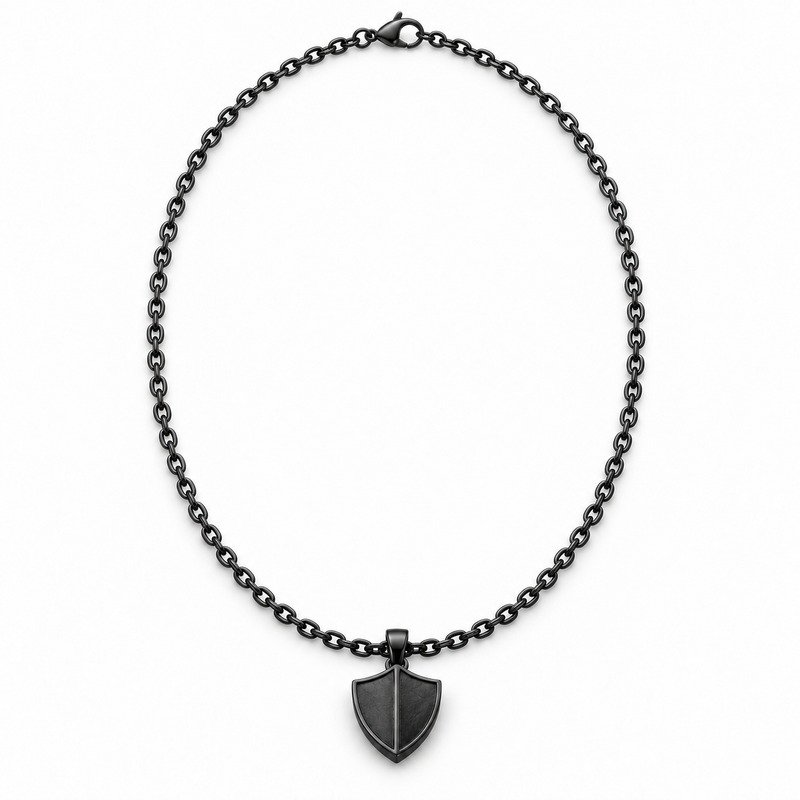 mens black Stainless Steel shield pendant necklace, front view on white