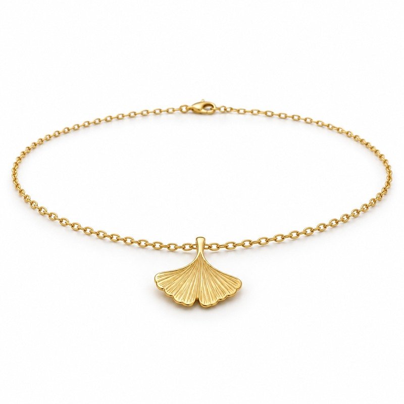 womens gold Stainless Steel ginkgo leaf pendant necklace, at a 45-degree angle on white