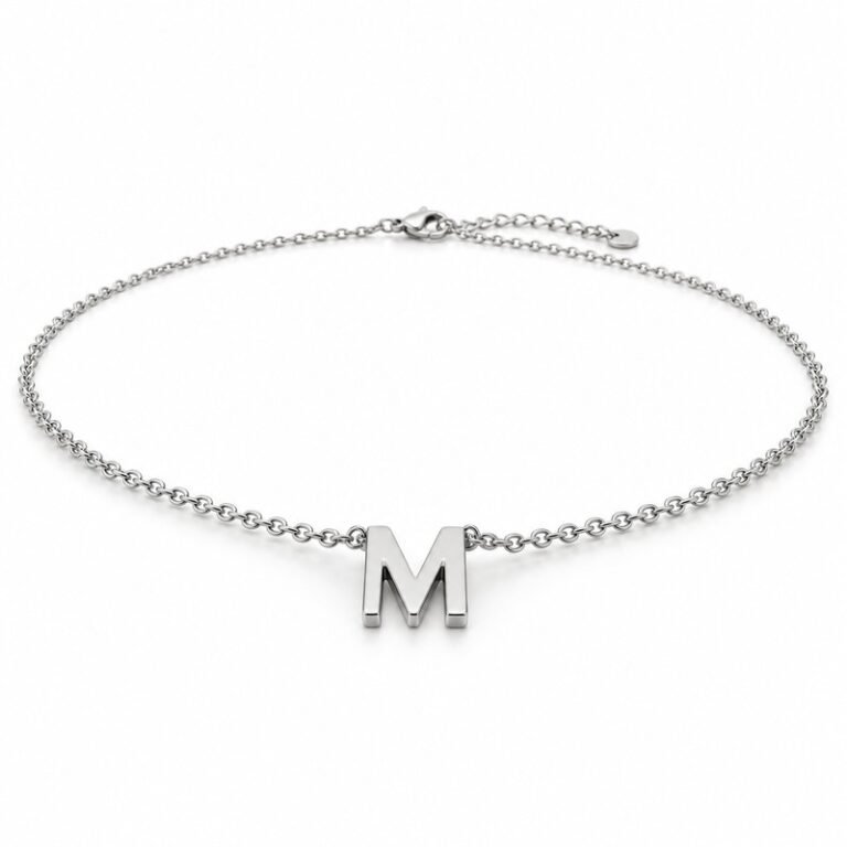 womens silver Stainless Steel initial m necklace, at a 45-degree angle on white