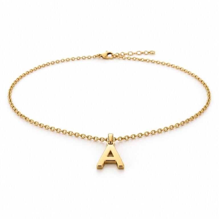 womens gold Stainless Steel initial a necklace, at a 45-degree angle on white