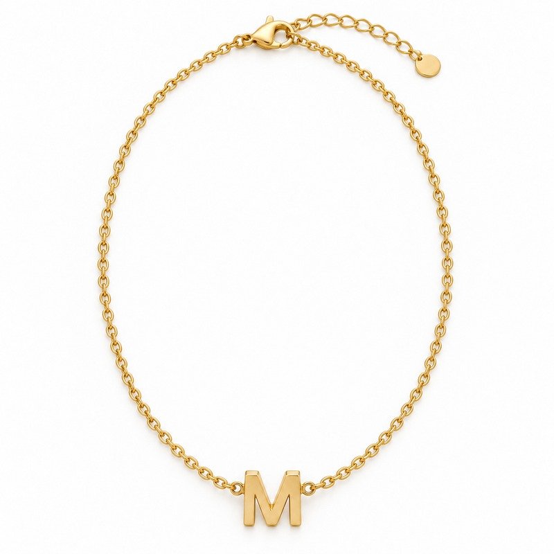 womens gold Stainless Steel initial m necklace, front view on white