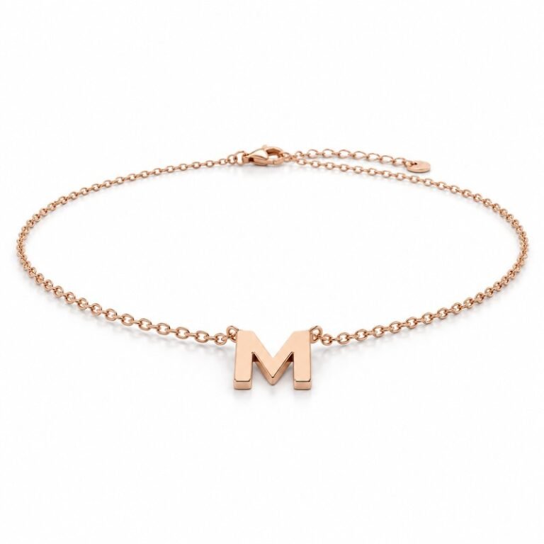womens rose gold Stainless Steel initial m necklace, at a 45-degree angle on white