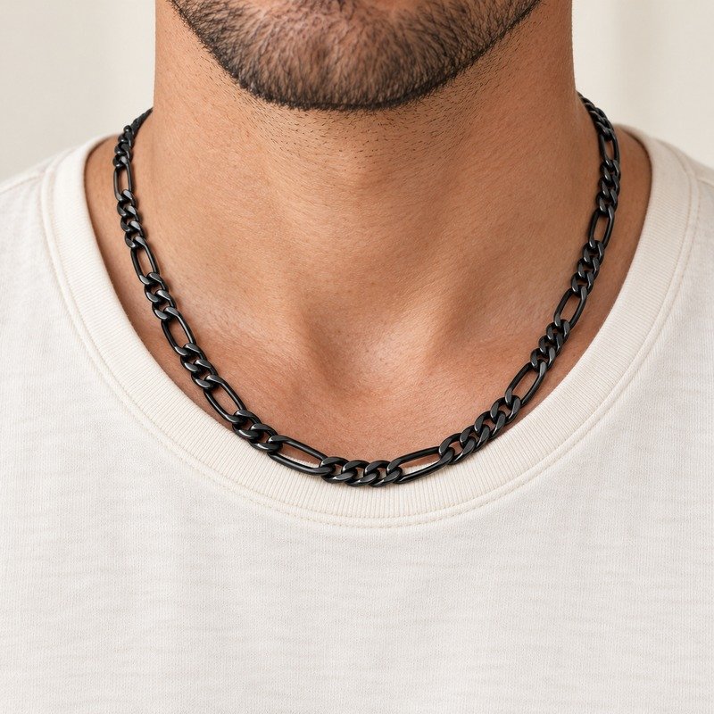 mens black Stainless Steel 5mm figaro chain necklace, worn by an adult model