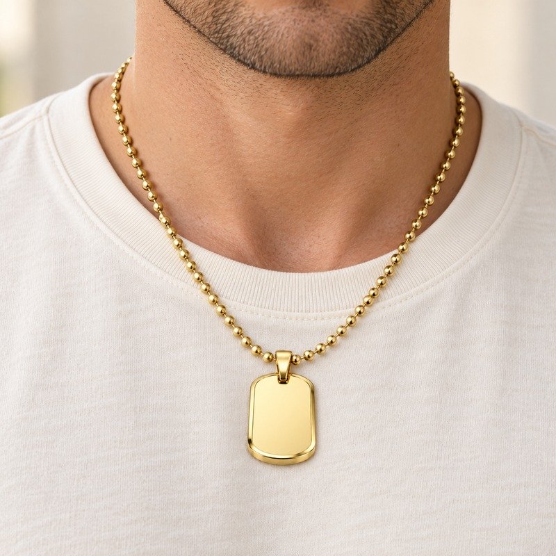 mens gold Stainless Steel beveled dog tag necklace, worn by an adult model