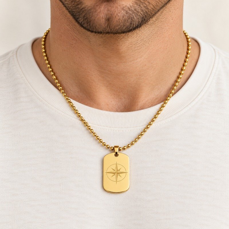 mens gold Stainless Steel compass dog tag necklace, worn by an adult model