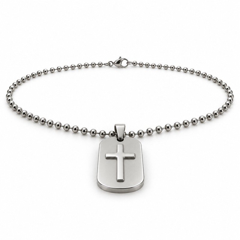 mens silver Stainless Steel cross relief dog tag necklace, at a 45-degree angle on white