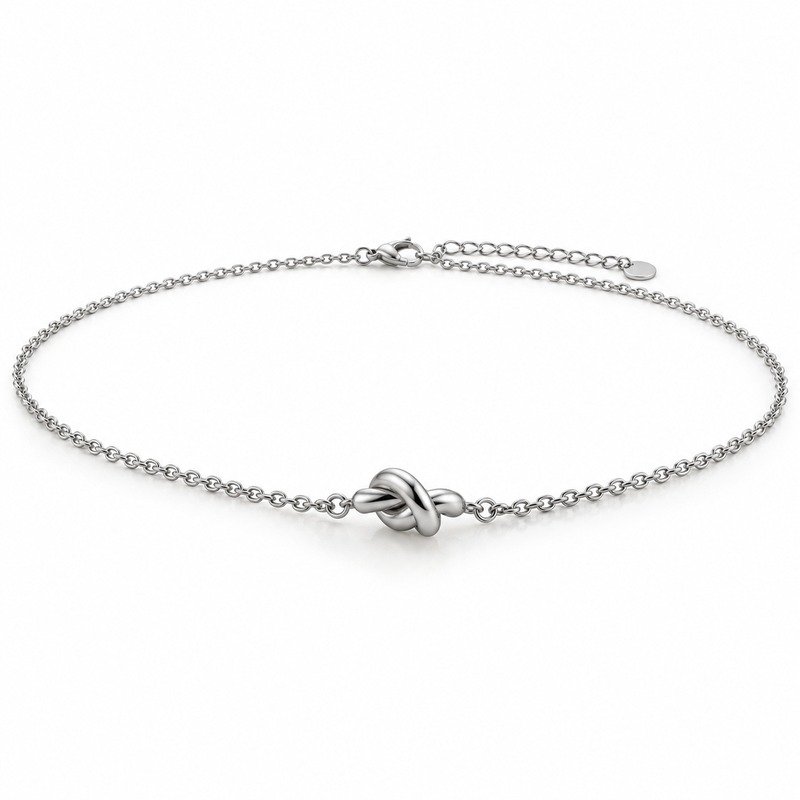 womens silver Stainless Steel knot necklace, at a 45-degree angle on white