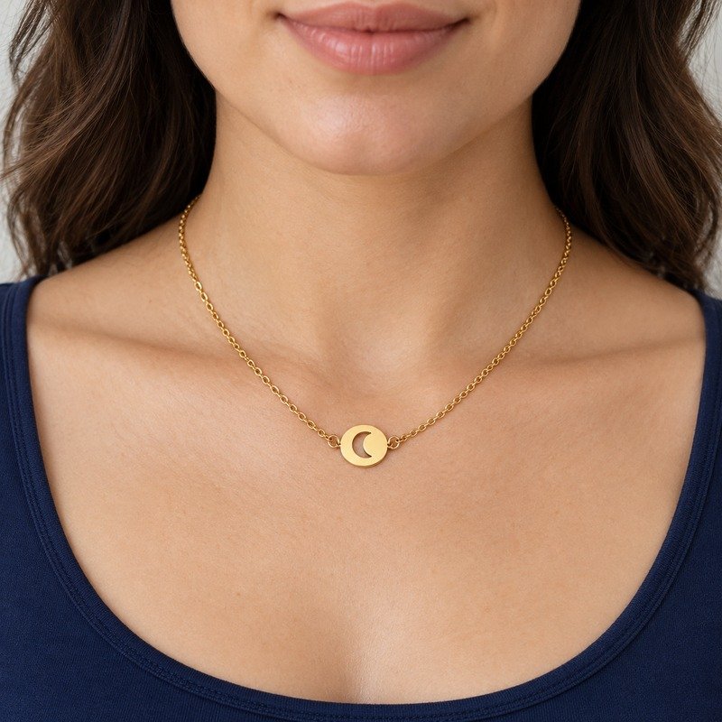womens gold Stainless Steel crescent disc necklace, worn by an adult model